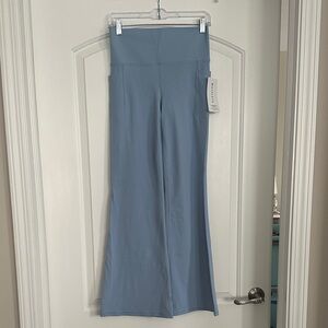 Athleta Salutation Stash Flare Leggings